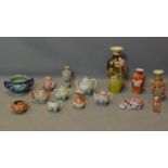 A collection of Oriental porcelain and ceramics, to include Japanese Satsuma vases, teapots, dishes,