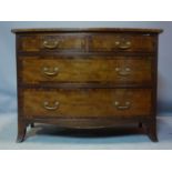 An early 19th century mahogany cross banded bow front chest of drawers, raised on splayed feet, H.80