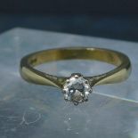 A 9ct gold diamond solitaire ring, claw set round cut diamond, approx 0.25 carats, 2.1g, size L