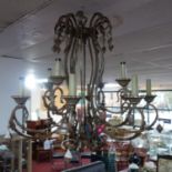 A large French metal 12 branch chandelier, H.77cm