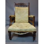 A Victorian mahogany chair raised on turned legs and castors, H.101 W.65cm