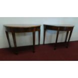 A pair of Adam style mahogany demi lune console tables. H.75 W.107 D.53cm