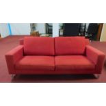 A Molteni & C sofa raised on chrome supports, H.75 W.210 D.90cm