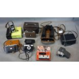 A collection of 6 vintage cameras to include 3 cine cameras, together with a pair of vintage