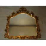 A Rococo style gilt mirror, 106 x 115cm