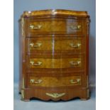 A serpentine gilt metal mounted walnut chest of four drawers, 90 x 79cm