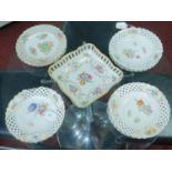 A set of eleven 19th century Meissen porcelain plates with floral designs, 1 restored and 1