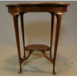 An Edwardian mahogany and satinwood inlaid and crossbanded oval topped side table. H.72 W.66 D.47cm