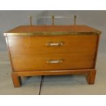 An oak military style brass bound low chest, makers label. H.63 W.90 D.52cm