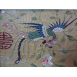 A Chinese embroidery of a bird, flowers and a prosperity symbol, framed, 40 x 54cm