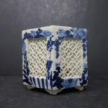 A Chinese blue and white pierced hexagonal brush pot, H.9 W.11 D.11cm