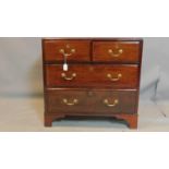 An early 19th century mahogany chest of drawers, raised on bracket feet, H.78 W.81 D.40cm