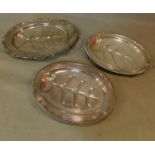 Three various silver plated meat dishes. L.49 W.36cm (largest)