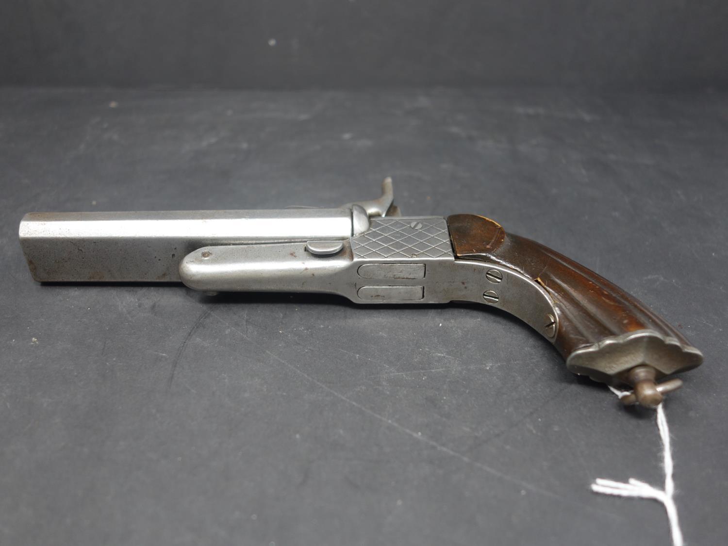 An antique double barrel percussion pistol - Image 7 of 8