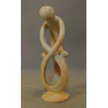 A carved marble study, adult and child. H.33cm