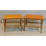 A pair of 20th century teak lamp tables, with slatted under tiers, H.46 W.57 D.41cm