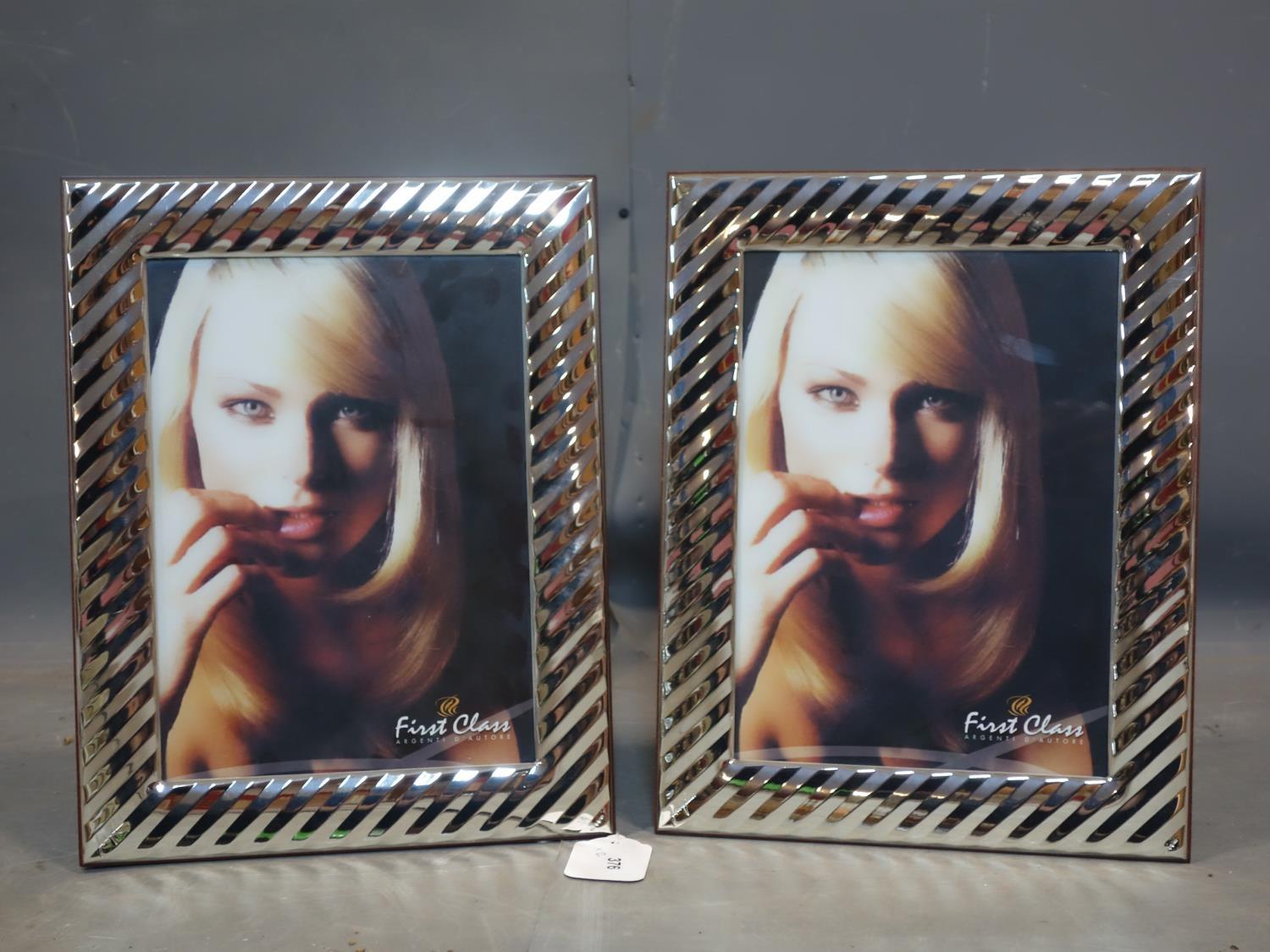 Two Italian silver frames by First Class Argenti D'Autore, boxed and with dust covers, 32 x 25cm