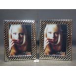 Two Italian silver frames by First Class Argenti D'Autore, boxed and with dust covers, 32 x 25cm