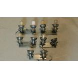 A set of 5 industrial style two sconce wall lights