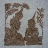A Thai rubbing of two deities in a garden setting, framed and glazed, 44 x 40cm