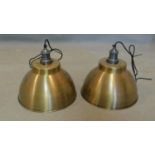 A pair of industrial style brass ceiling light pendants, H.30 D.33cm