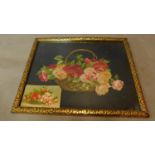 A framed and glazed tapestry depicting flowers in a bowl. 33x42cm