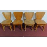 A set of four continental country style pine dining chairs. H.81 W.47 D.42cm