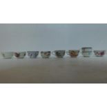 A miscellaneous collection of 19th century continental porcelain cups. (8)