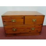 A pine military style brass bound chest. H.46 W.76 D.46cm