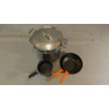 A Cuisinart steamer and 2 Le Creuset pans and a Le Creuset saucepan H.28 W.36