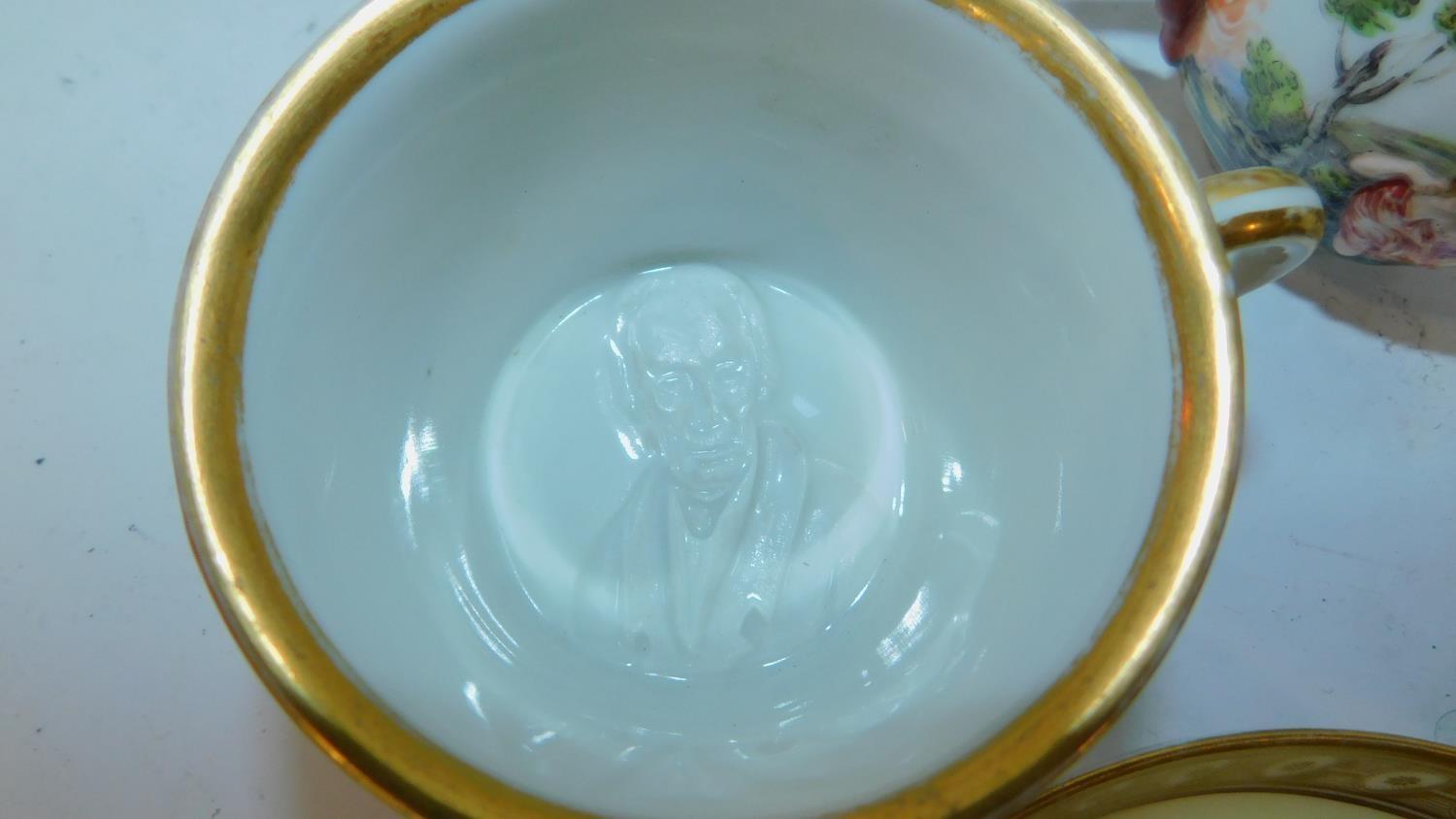 A miscellaneous collection of porcelain cups, some with saucers, mostly 19th century continental (6) - Image 3 of 7