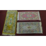 3 Chinese style rugs all set on a pastel field with central floral medallion within floral boarders.