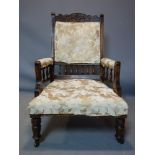 A Victorian chair raised on turned legs and castors, H.102 W.65cm