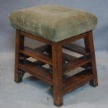 An oak stool, on square legs with peripheral stretchers, H.51 W.44 D.40cm