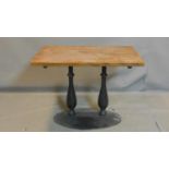 A Pedrali pub table with oak top, raised on black steel base, H.75 W.100 D.65cm