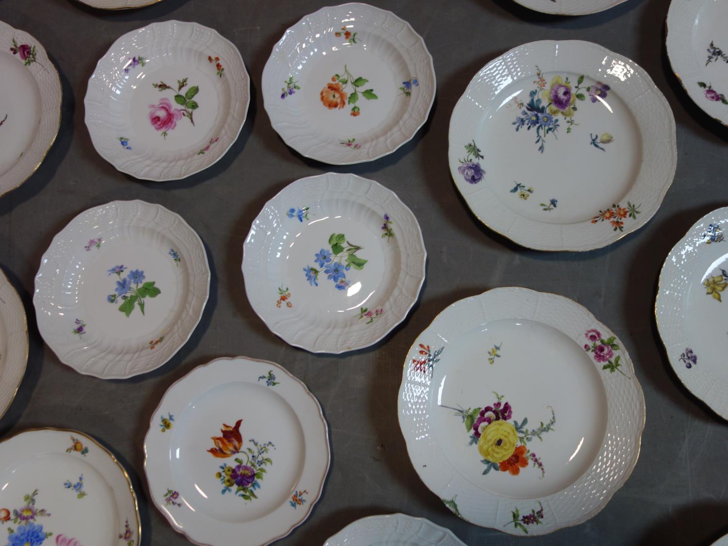 A collection of Meissen porcelain to include 23 plates, a cup and a sugar pot - Image 2 of 5