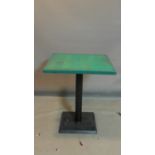 A Pedrali tilt top pub table with painted square oak top, raised on black steel base, H.76 W.65 D.