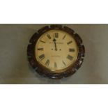 A 19th century carved mahogany cased wall clock, Black and Murray Calcutta H.43 W.43 D.18