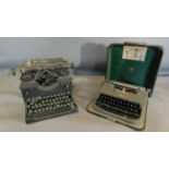 A vintage Royal typewriter and a 1970's cased example. H.24 W.38 D.40
