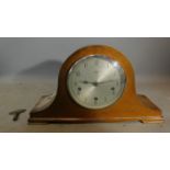 An oak cased Smiths Enfield mantel clock. H.43 W.23 D.12cm