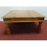 An Indian teak square topped iron bound low table. H.41 W.80 D.80cm