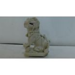 An 18th century Chinese Blanc de Chine dog of Fo (some damage) H.12 W.8cm