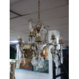 A French gilt metal chandelier with glass droplets, H.60cm