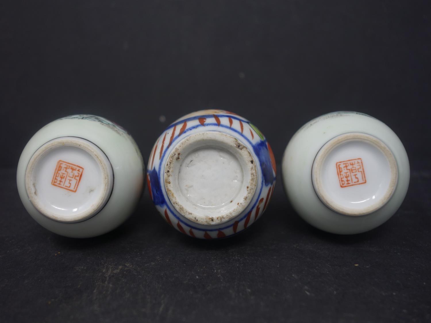 A pair of Chinese miniature vases, decorated with a lady in a garden setting, seal mark to bases, - Image 2 of 3