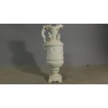 A decorative Continental urn H.45 W.18 (repair to base)