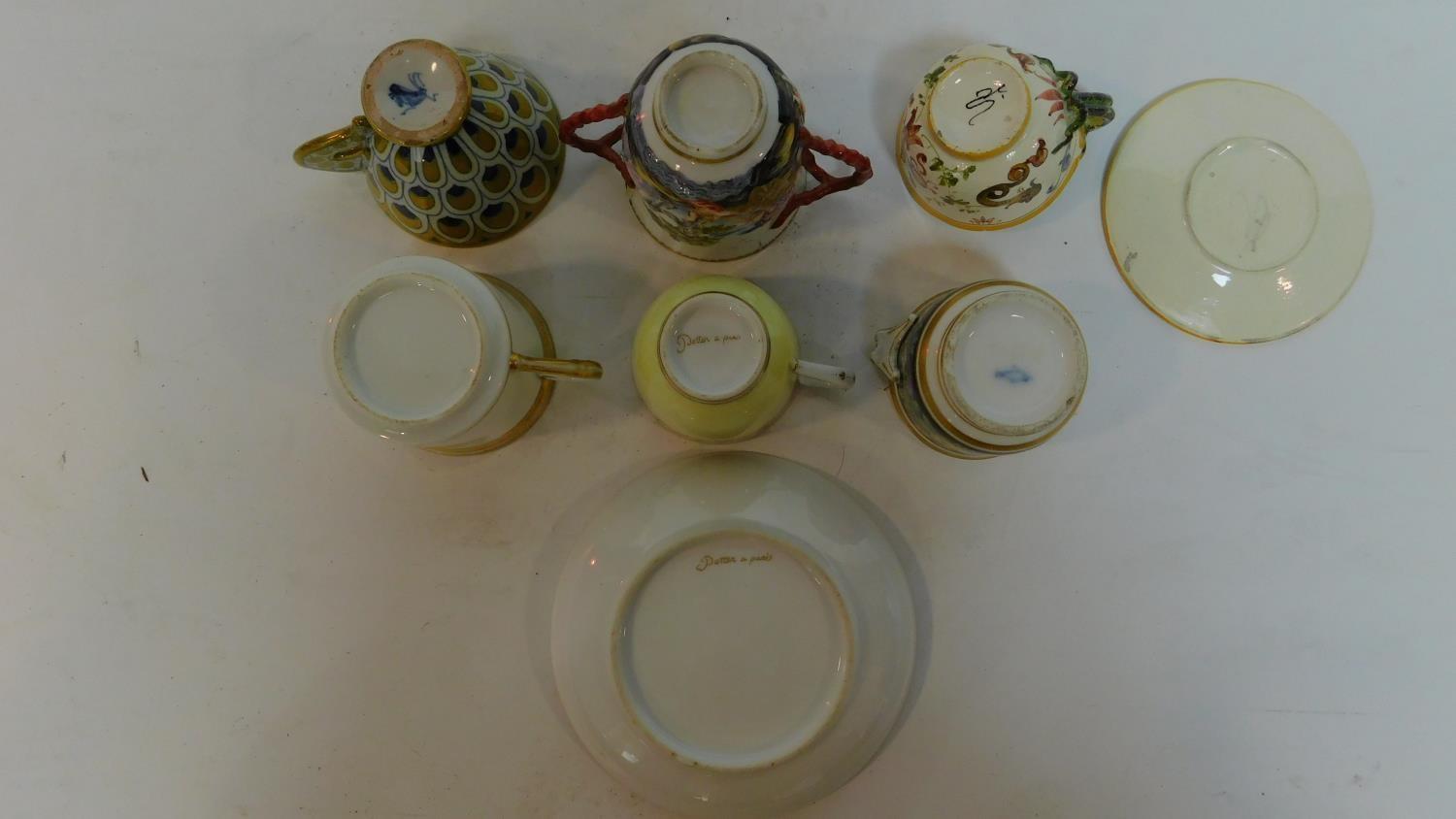 A miscellaneous collection of porcelain cups, some with saucers, mostly 19th century continental (6) - Image 4 of 7