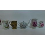 A 19th century blue and white teapot and other jugs and tankards (5) Jugs H.18 W.14cm (largest)