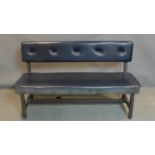 An industrial steel framed bench with faux leather upholstered seat and back rest, H.92 W.152 D.55cm