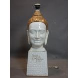 A Buddha head lamp by Bonsan, with gilt detailing, bearing 'Buddha Camlodge S-XII to tapering