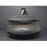 An Africa tribal bowl and cover, H.22cm Diameter 24cm